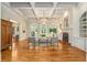 Spacious living room features a fireplace, coffered ceilings, and beautiful windows at 1655 Arrowhead Ne Trl, Atlanta, GA 30345
