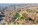 Aerial view of property showing home, barn, and surrounding land at 450 Pat Rich Dr, Canton, GA 30115