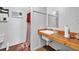 Clean bathroom with a sink, toilet and wooden countertop at 450 Pat Rich Dr, Canton, GA 30115