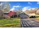 Ranch style home with attached two-car garage and expansive lawn at 450 Pat Rich Dr, Canton, GA 30115