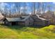 Rustic home with attached barn, offering ample space at 450 Pat Rich Dr, Canton, GA 30115