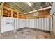 Spacious horse stable with individual stalls and concrete flooring at 450 Pat Rich Dr, Canton, GA 30115
