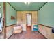 Simple interior room with wood flooring and light green walls at 450 Pat Rich Dr, Canton, GA 30115