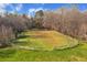 Spacious riding arena encircled by a white fence at 450 Pat Rich Dr, Canton, GA 30115