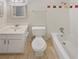 Functional bathroom featuring a tub with shower, vanity, and neutral tile at 3510 Stonewall Se Pl, Atlanta, GA 30339