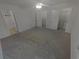 Bedroom with closets, carpet and a ceiling fan at 3510 Stonewall Se Pl, Atlanta, GA 30339
