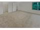 Bedroom with closets, carpet and a window at 3510 Stonewall Se Pl, Atlanta, GA 30339