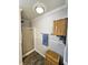 Bathroom featuring a glass shower, wood look flooring and vintage decor at 57 Glenn Eagles Way, Hiram, GA 30141