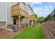 View of multiple decks and backyard, showing multiple home units at 3653 Willingham Sw Run, Marietta, GA 30008