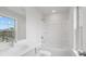 Clean bathroom with white vanity and shower/tub combo at 3653 Willingham Sw Run, Marietta, GA 30008