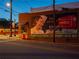 Exterior shot of a vintage building showcasing a painted advertisement, capturing nostalgic Americana at 3317 Stillwood Ln, Hapeville, GA 30354