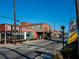 Vibrant street view showcasing local businesses, bustling activity, and urban charm at 3317 Stillwood Ln, Hapeville, GA 30354