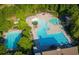Overhead shot of a multi-feature community pool with slides and a lifeguard station at 3025 Sunset Pass, Canton, GA 30114