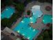 An aerial view of a community pool showcasing a variety of swimming and lounging areas at 3025 Sunset Pass, Canton, GA 30114