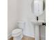 Bathroom featuring pedestal sink and commode at 3025 Sunset Pass, Canton, GA 30114