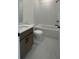 Bathroom with a tub, white tiled walls, toilet, and a vanity with a light countertop at 3025 Sunset Pass, Canton, GA 30114