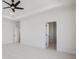 Spacious bedroom featuring a ceiling fan, carpeted floor, and neutral walls at 3025 Sunset Pass, Canton, GA 30114