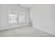Bright bedroom with neutral walls, carpeted floors, and a window at 3025 Sunset Pass, Canton, GA 30114