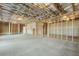 Unfinished basement with stud walls, a concrete floor, and exposed ceiling framing at 3025 Sunset Pass, Canton, GA 30114
