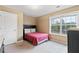 Small bedroom with window and closet at 1123 Diamond Xing, Mcdonough, GA 30252