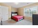 Cozy bedroom with a double bed and large window at 1123 Diamond Xing, Mcdonough, GA 30252