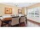 Formal dining room with hardwood floors and chandelier at 1123 Diamond Xing, Mcdonough, GA 30252