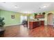 Spacious kitchen with hardwood floors and modern appliances at 1123 Diamond Xing, Mcdonough, GA 30252