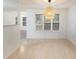 Dining area with hardwood floors and a large window at 1089 Magnolia Dr, Villa Rica, GA 30180