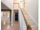 Bright entryway with wooden staircase and hardwood floors at 1089 Magnolia Dr, Villa Rica, GA 30180