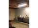 Basement with work table and paint supplies at 358 Gold Mine Rd, Dallas, GA 30157