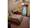 Bright bedroom with a patterned quilt, soft carpet, and a cozy atmosphere at 358 Gold Mine Rd, Dallas, GA 30157