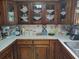 Well-organized kitchen with wooden cabinets and ample counter space for food preparation at 358 Gold Mine Rd, Dallas, GA 30157