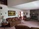 Comfortable living room features a stone fireplace and plush seating, perfect for relaxation at 358 Gold Mine Rd, Dallas, GA 30157