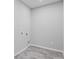 Practical laundry room with tile flooring and utility connections at 128 Laurel Farms Ln, Dallas, GA 30157