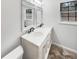 Stylish bathroom with a double vanity, marble countertop, and modern fixtures, offering a luxurious feel at 2713 Laurel View Dr, Snellville, GA 30039