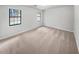 Cozy bedroom with plush carpeting and natural light, perfect for restful nights at 2713 Laurel View Dr, Snellville, GA 30039