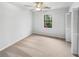 Bedroom featuring neutral carpet, a window, a ceiling fan and a closet at 2713 Laurel View Dr, Snellville, GA 30039
