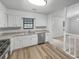 Updated kitchen with modern appliances, stainless steel dishwasher, and ample counter space at 2713 Laurel View Dr, Snellville, GA 30039