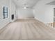 Bright and open living room featuring neutral carpet and a white-painted fireplace at 2713 Laurel View Dr, Snellville, GA 30039