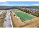 An aerial view of sports fields with bleachers and other community amenities at 6670 Benchwood Path, Cumming, GA 30028