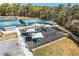 Community playground and tennis courts with sunshades at 6670 Benchwood Path, Cumming, GA 30028