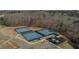 Community tennis courts with sun shelters and a playground, offering fun for all ages at 6670 Benchwood Path, Cumming, GA 30028
