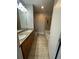 Bathroom featuring a double vanity, tile flooring, and a separate bathtub and shower at 171 Auburn Ave # 329, Atlanta, GA 30303