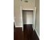Open closet with white walls, shelving, and dark hardwood floors at 171 Auburn Ave # 329, Atlanta, GA 30303