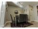 Dining room area with sleek table, comfortable chairs, and modern decorative mirror at 171 Auburn Ave # 329, Atlanta, GA 30303