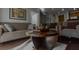 Open living room with comfortable seating and hardwood floors perfect for relaxing and entertaining at 171 Auburn Ave # 329, Atlanta, GA 30303