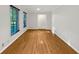 Bright living room featuring hardwood floors and natural light from two large windows at 3371 Vandiver Dr, Marietta, GA 30066