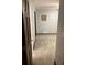 An open view to a bedroom with neutral paint, carpet flooring, and white trim at 5741 Wolf Laurel, Lilburn, GA 30047