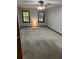 This spacious bedroom has two windows and plush carpeting at 5741 Wolf Laurel, Lilburn, GA 30047