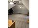 Expansive carpeted bonus room with fans and unique ceiling, perfect for recreation or storage at 5741 Wolf Laurel, Lilburn, GA 30047